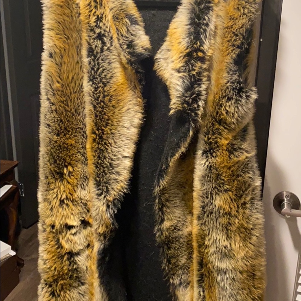 Knee length faux fur vest